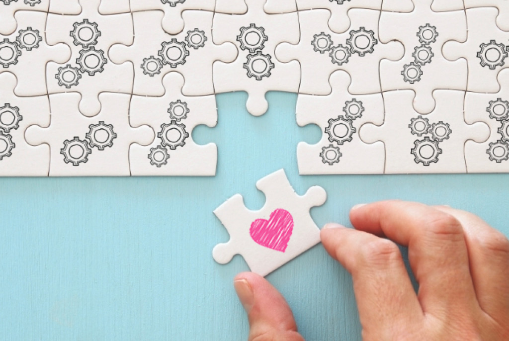 Puzzle piece heart into gears